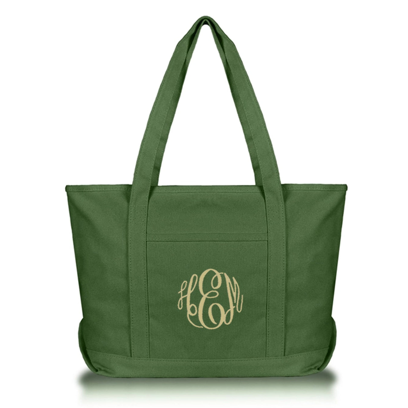 Green tote bag with an embroidered monogram on a white background