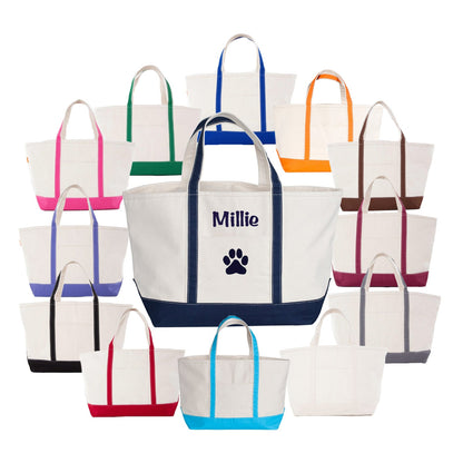 Set of colorful tote bags with personalized names and paw prints on a white background