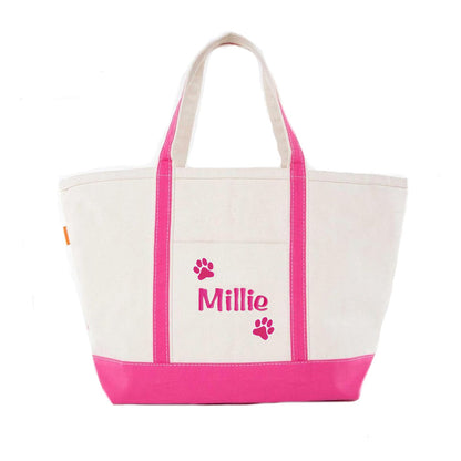 White tote bag with pink accents and name printed on it, on a white background
