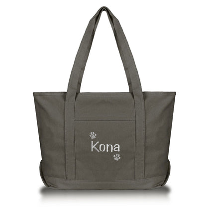 Gray dog tote bag with embroidered name and dog paws for doggie daycare