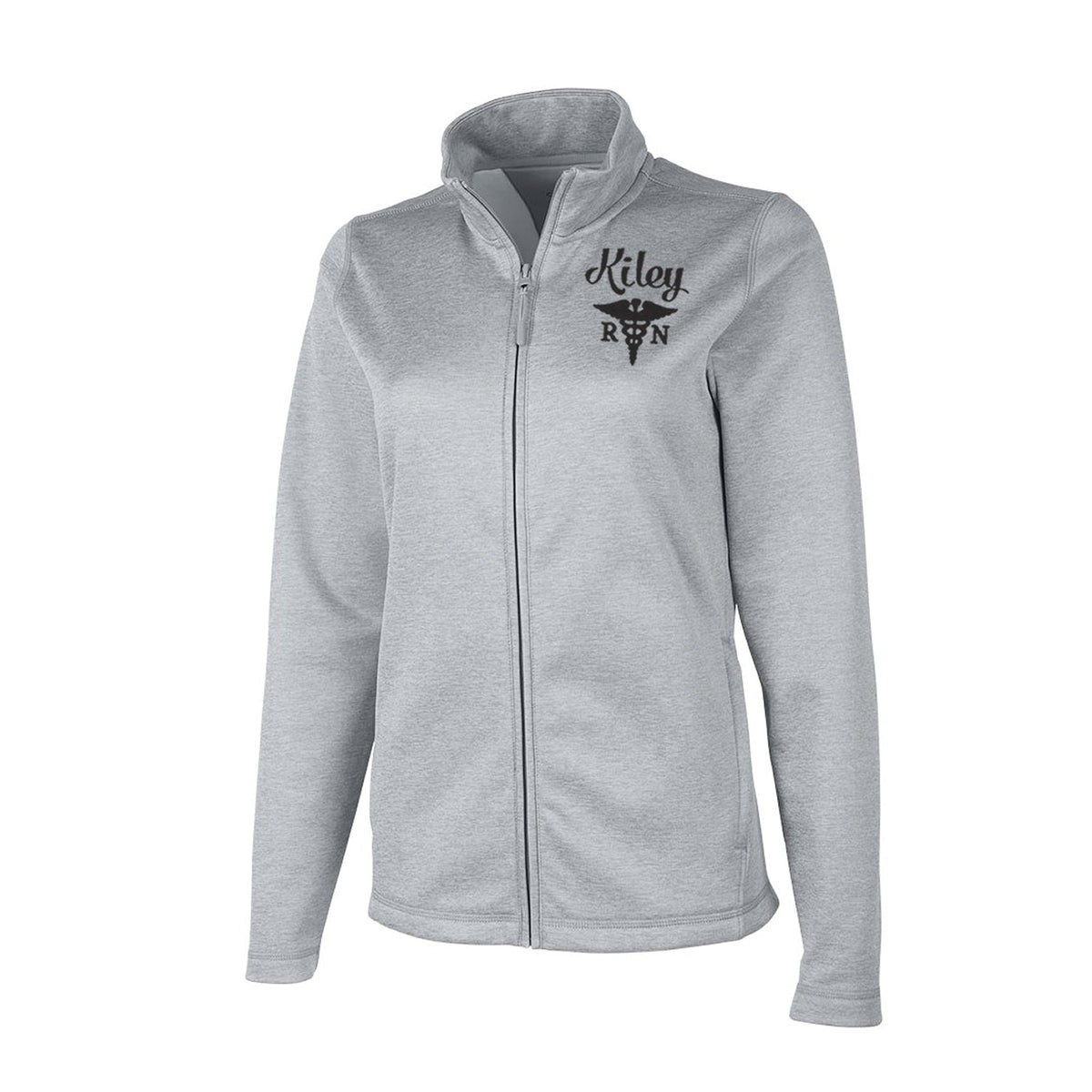 RN Nurse Jacket- Scrubs Jacket - A light gray heather zip-up jacket with a stand collar, featuring a black embroidered logo on the left chest that reads 'Kiley RN' with a caduceus medical graphic, shown against a plain white background.