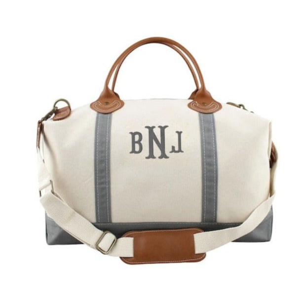 gray monogrammed weekender bag with leather handles