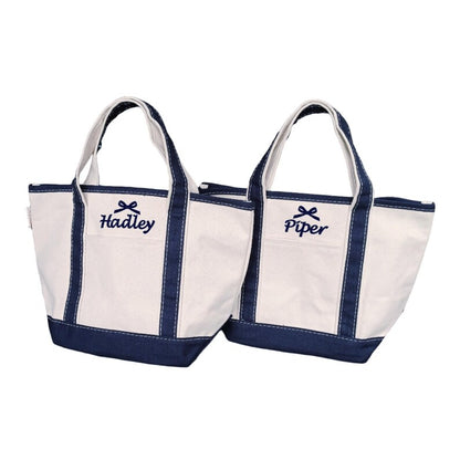 mini canvas tote with embroidered name and bow design