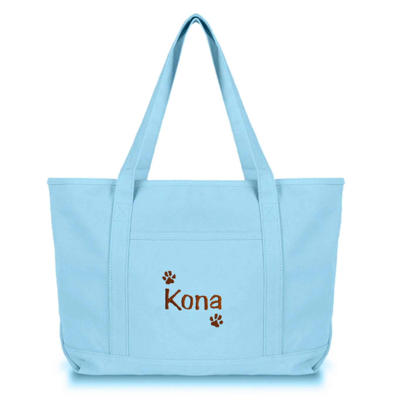 Light blue tote bag with dog name and paws embroidered on it  