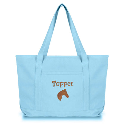 Light blue tote bag with horse  icon on and embroidered name