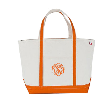 orange canvas zipper top tote bag with embroidered monogram