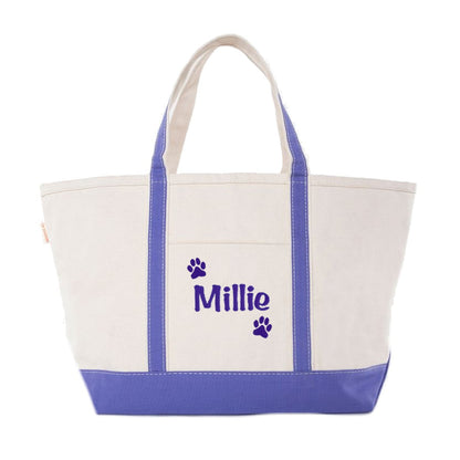 Tote bag with name and paw print design on a white background