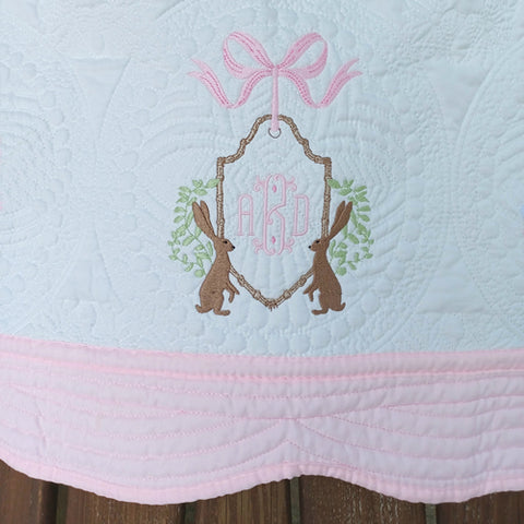 heirloom style baby quilt with monogram and rabbits