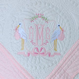 Stork Monogram Crest on Heirloom Style baby quilt