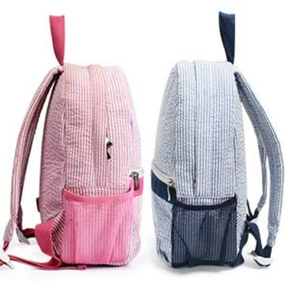 mesh pockets shown on seersucker backpacks