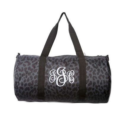 black leopard print duffel with monogram